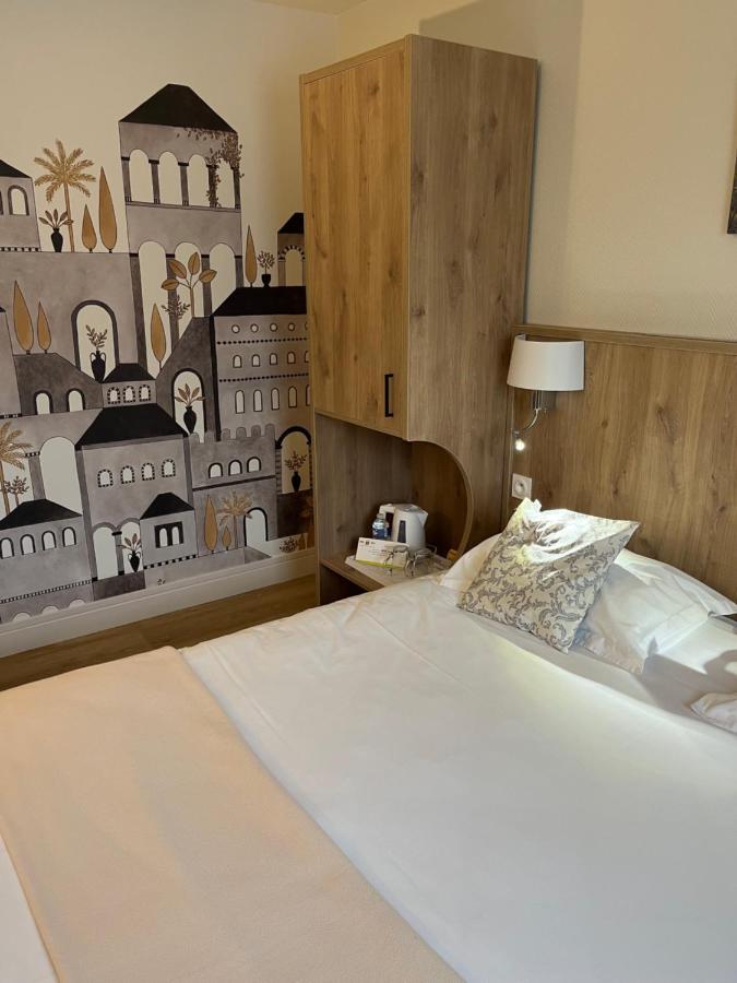 Logis Hotel Restaurant Du Lion D'Argent Et Des Tanneries Ла-Шатр Экстерьер фото